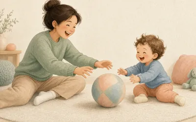 Illustration: Big-ball rolling game, Sit facing each other and roll a large soft ball back and forth